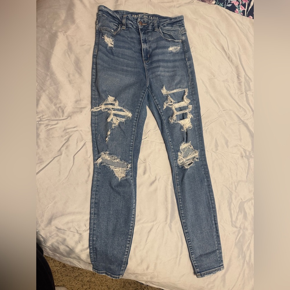 American Eagle Outfitters High Rise Blue Jeans with Distressed Details